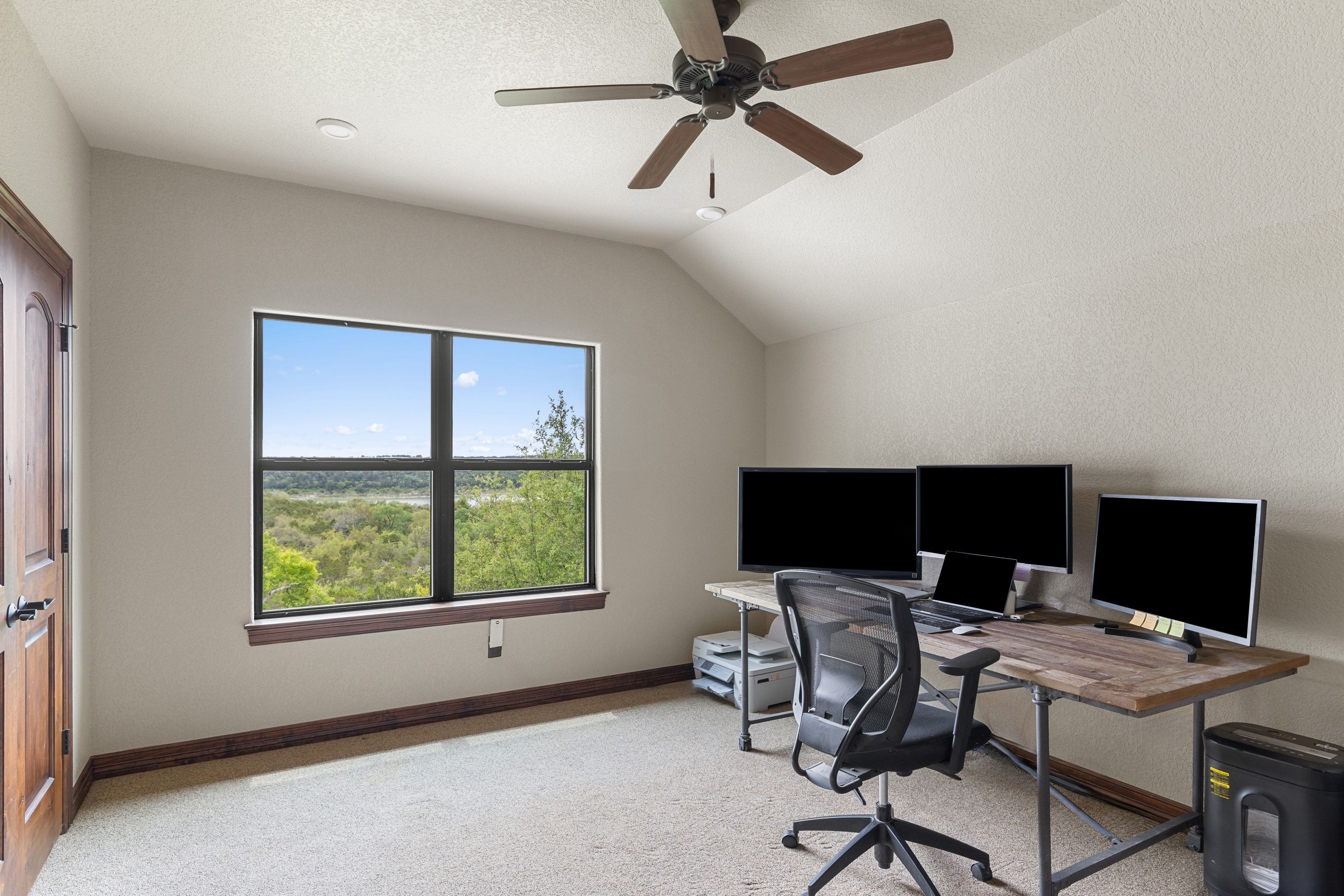 Study at Lakehaven with lake-facing windows and views